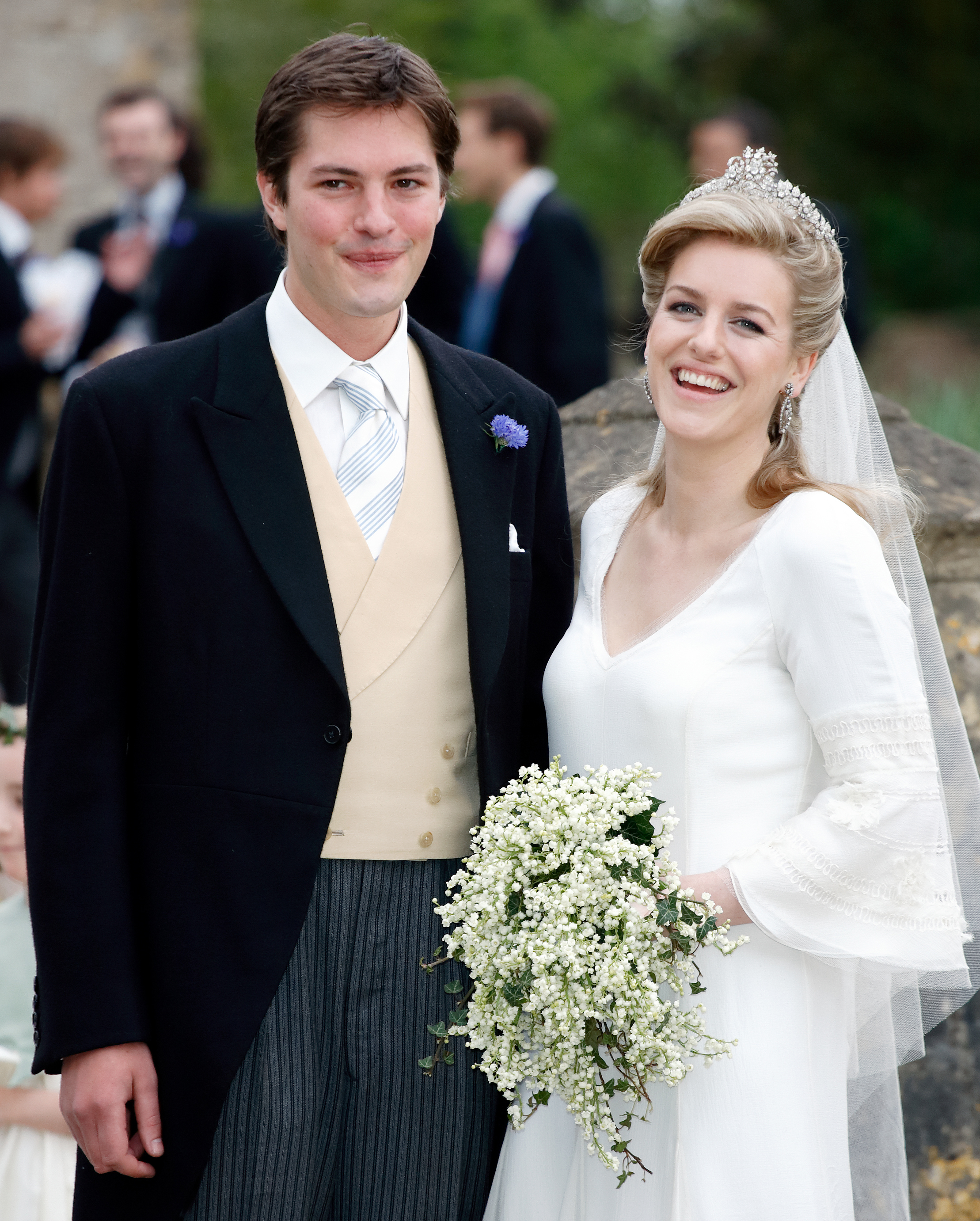 Harry Lopes and Laura Parker Bowles after their wedding at St Cyriac's Church on May 6, 2006, in Lacock, England. | Source: Getty Images