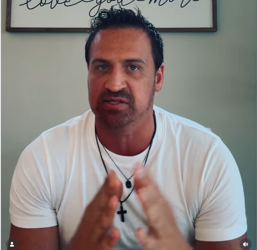 Ryan Lochte leans toward the camera with both hands positioned closely together, maintaining an intense and focused expression as he talks. | Source: Instagram/ryanlochte