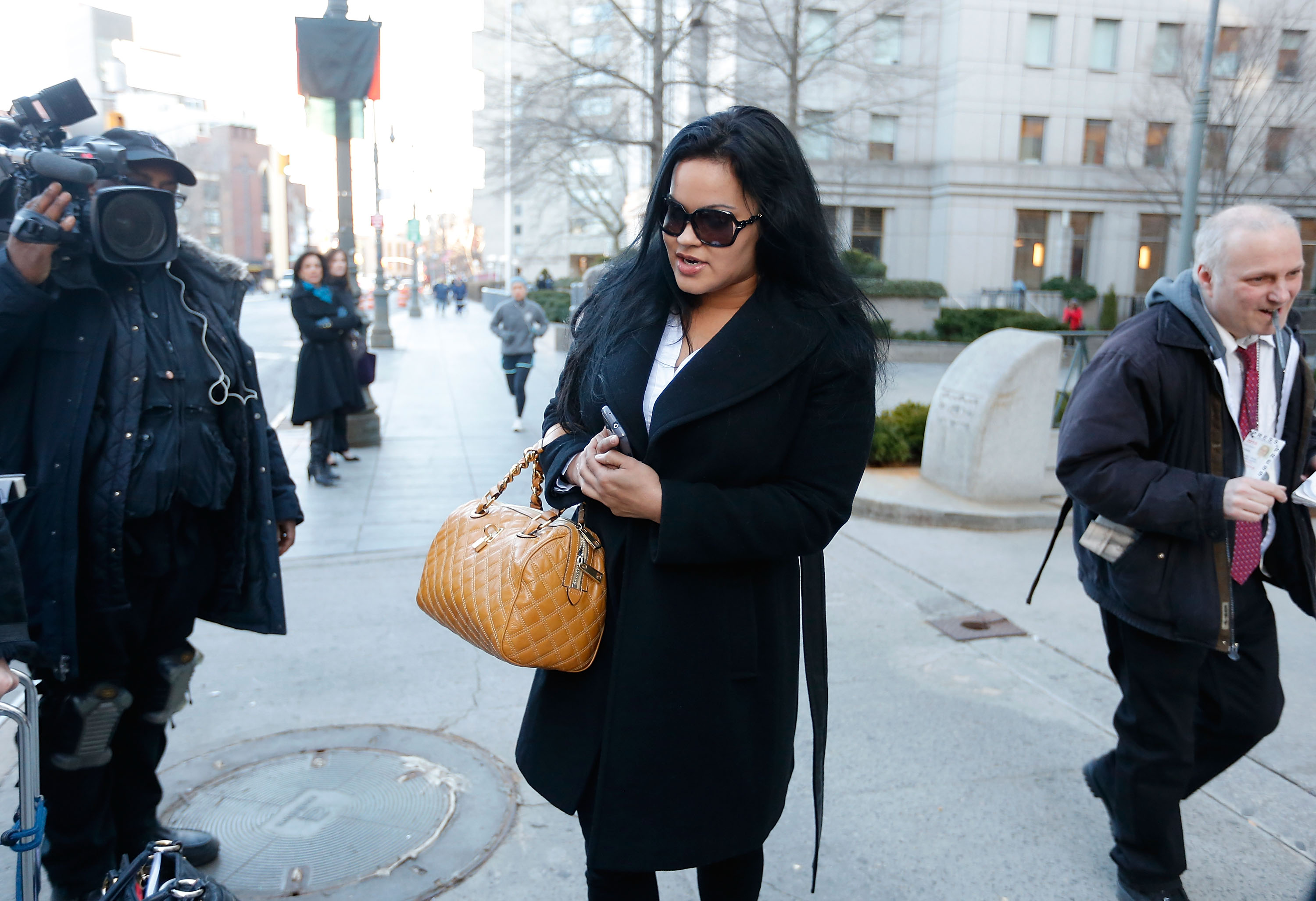 Liza Morales departs New York Supreme court after a custody hearing with ex-boyfriend NBA player Lamar Odom at New York State Supreme Court, on March 5, 2013, in New York City. | Source: Getty Images