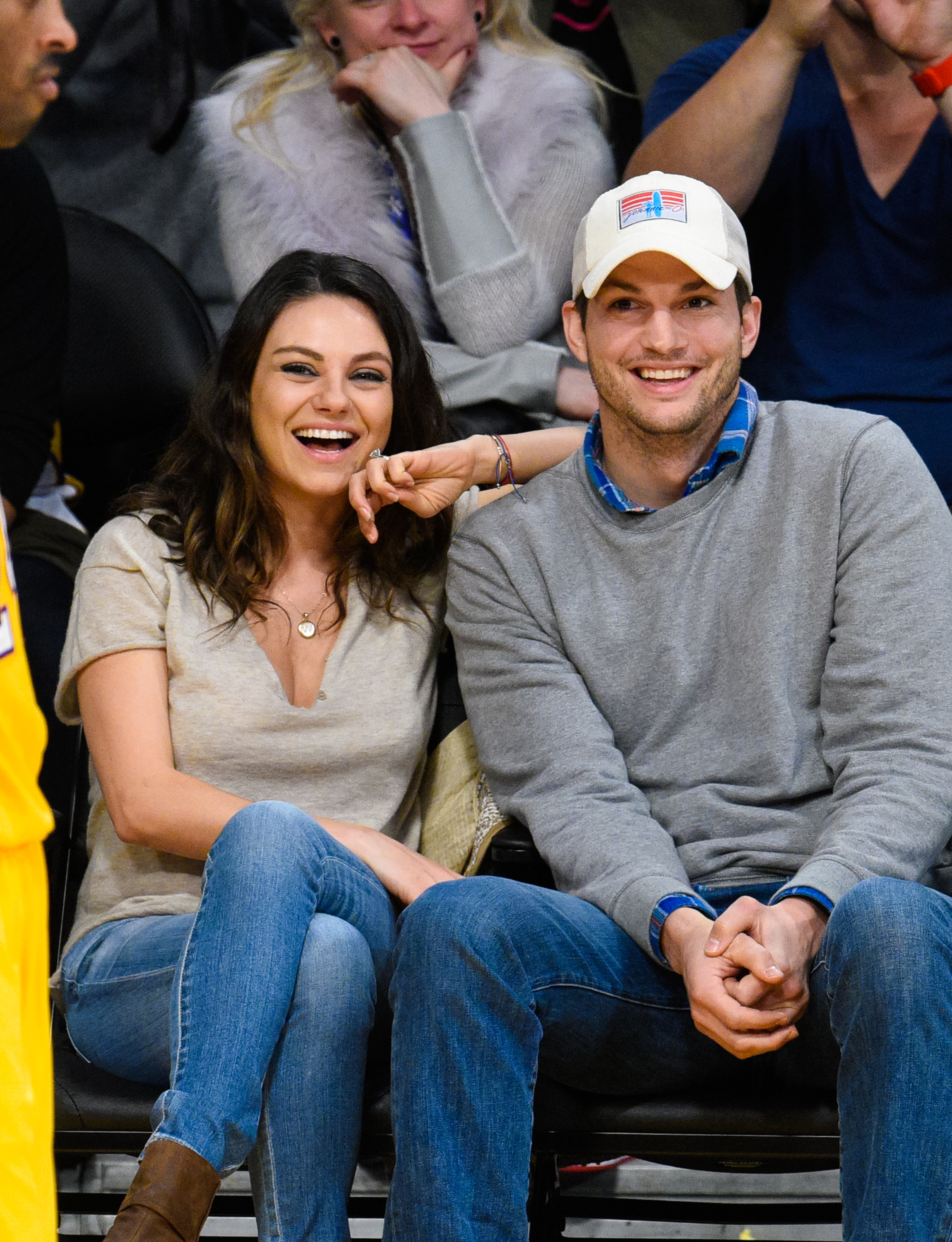 Mila Kunis and Ashton Kutcher at a basketball game between the Oklahoma City Thunder and Los Angeles Lakers on December 19, 2014, in Los Angeles, California. | Source: Getty Images