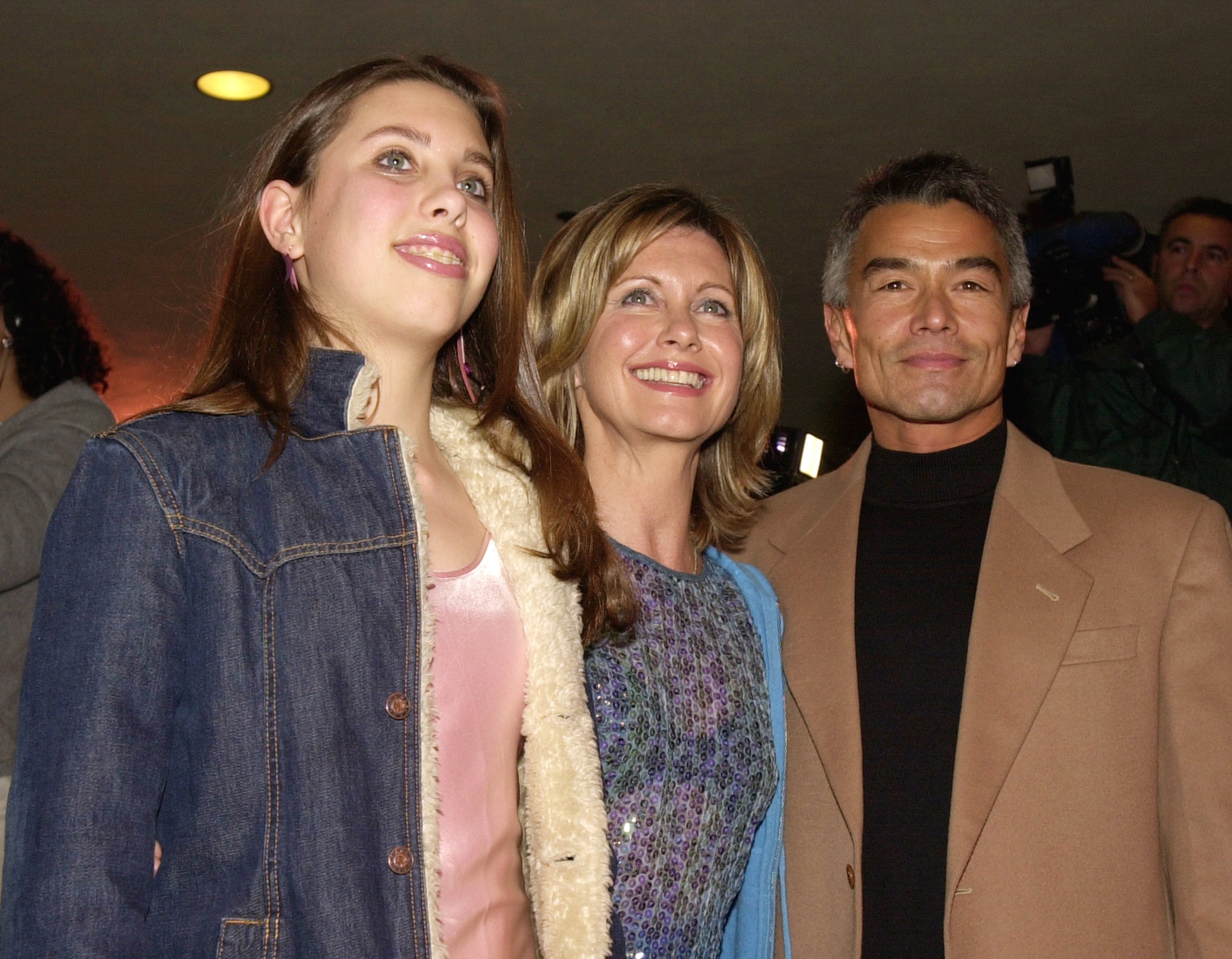 Chloe Lattanzi, Olivia Newton-John, and Patrick Kim McDermott at the "Mamma Mia!" New York opening night on February 26, 2001. | Source: Getty Images