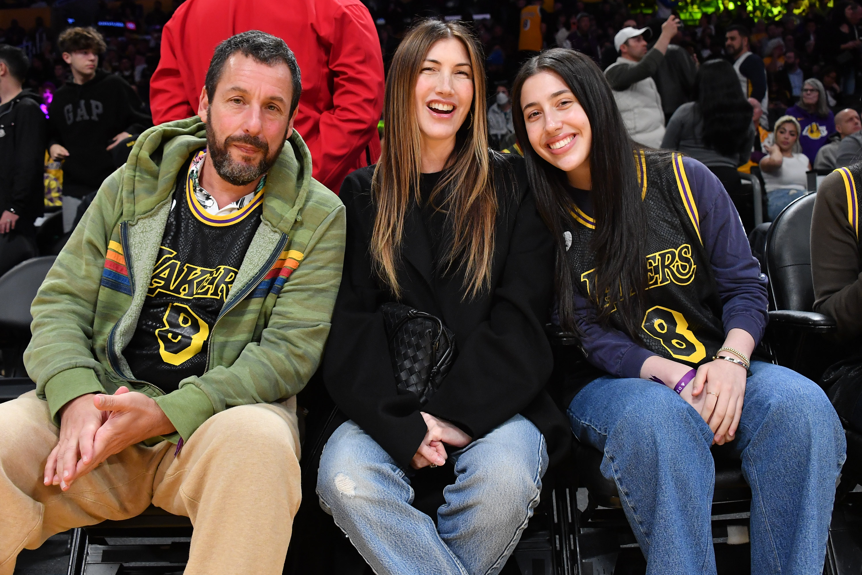 Adam, Jackie, and Sadie Sandler attend a basketball game between the Los Angeles Lakers and the Denver Nuggets in Los Angeles, California, on February 8, 2024 | Source: Getty Images