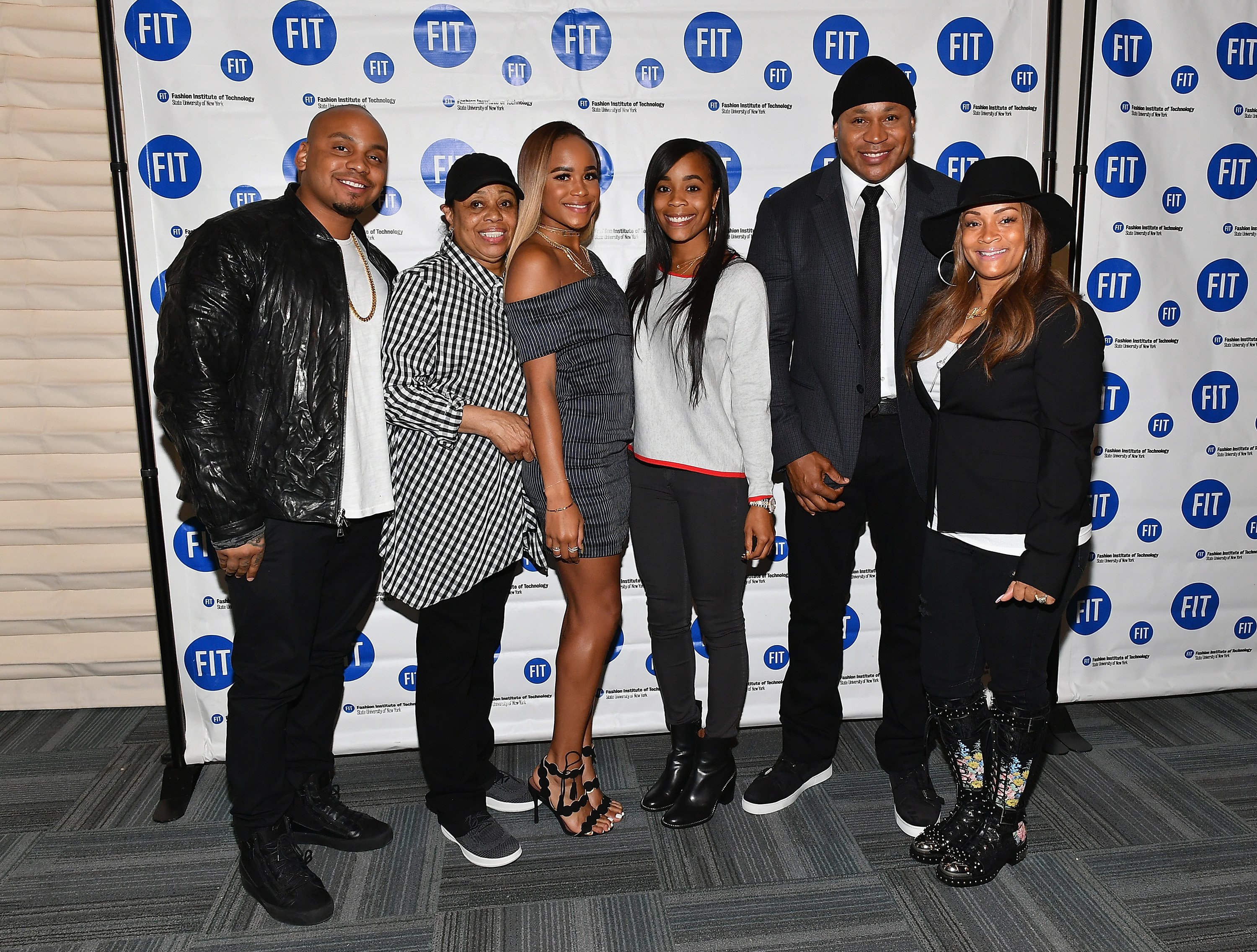 Najee Smith, Ondrea Smith, Samaria Leah Smith, Simon Smith, LL Cool J, and  Italia Smith attend the Fashion Technology Institute's 2017 Commencement Ceremony at Arthur Ash Stadium in New York. | Source: Getty Images