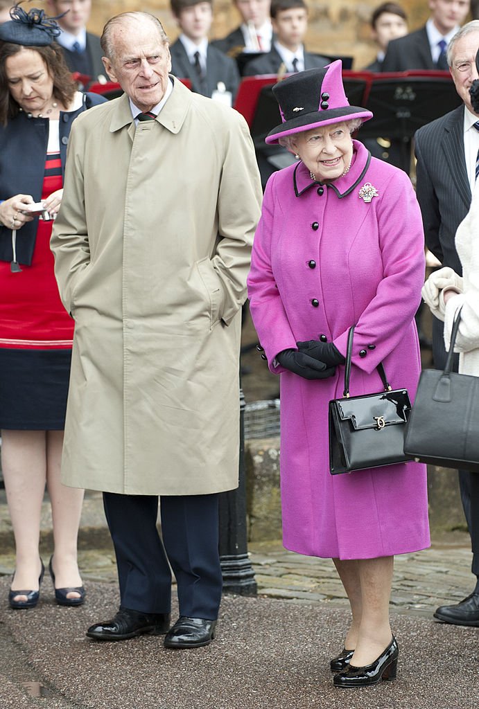 Queen Elizabeth Ll And Duke Of Edinburgh Visit Sherborne Abbey And Visit A Mad Hatters Tea Party  | Photo: Getty Images