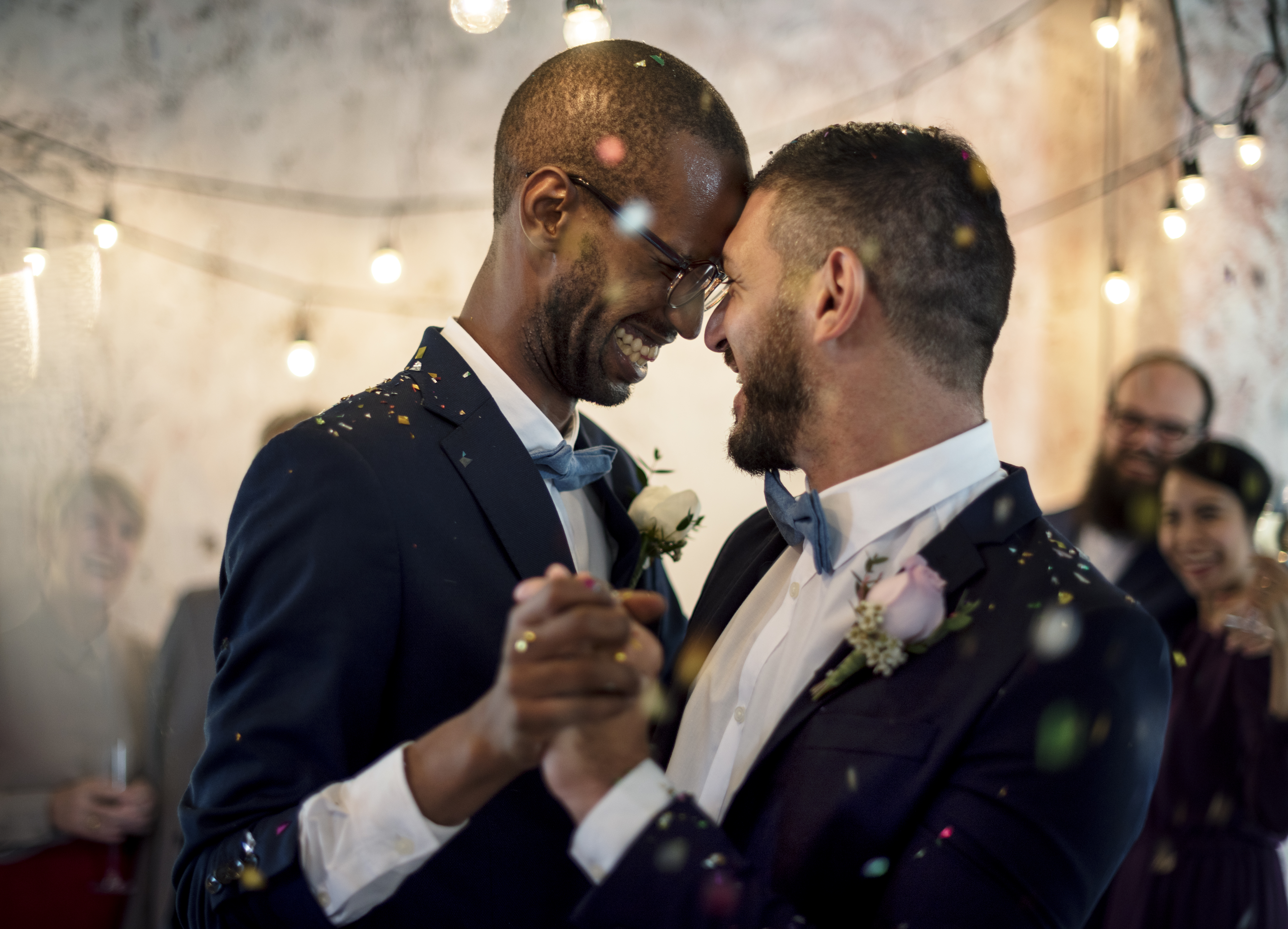 A close-up photo of a newlywed gay couple | Source: Shutterstock