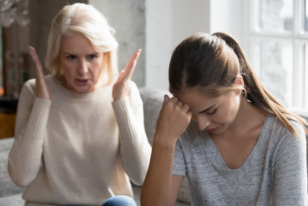 Aged mother yelling at her grown up daughter. | Photo: Shutterstock.