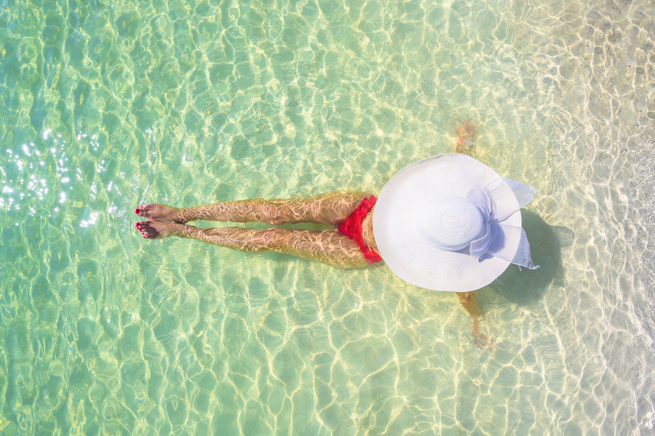 Frau entspannt sich am Strand in Playa del Carmen, Quintana Roo, Mexiko I Quelle: Getty Images