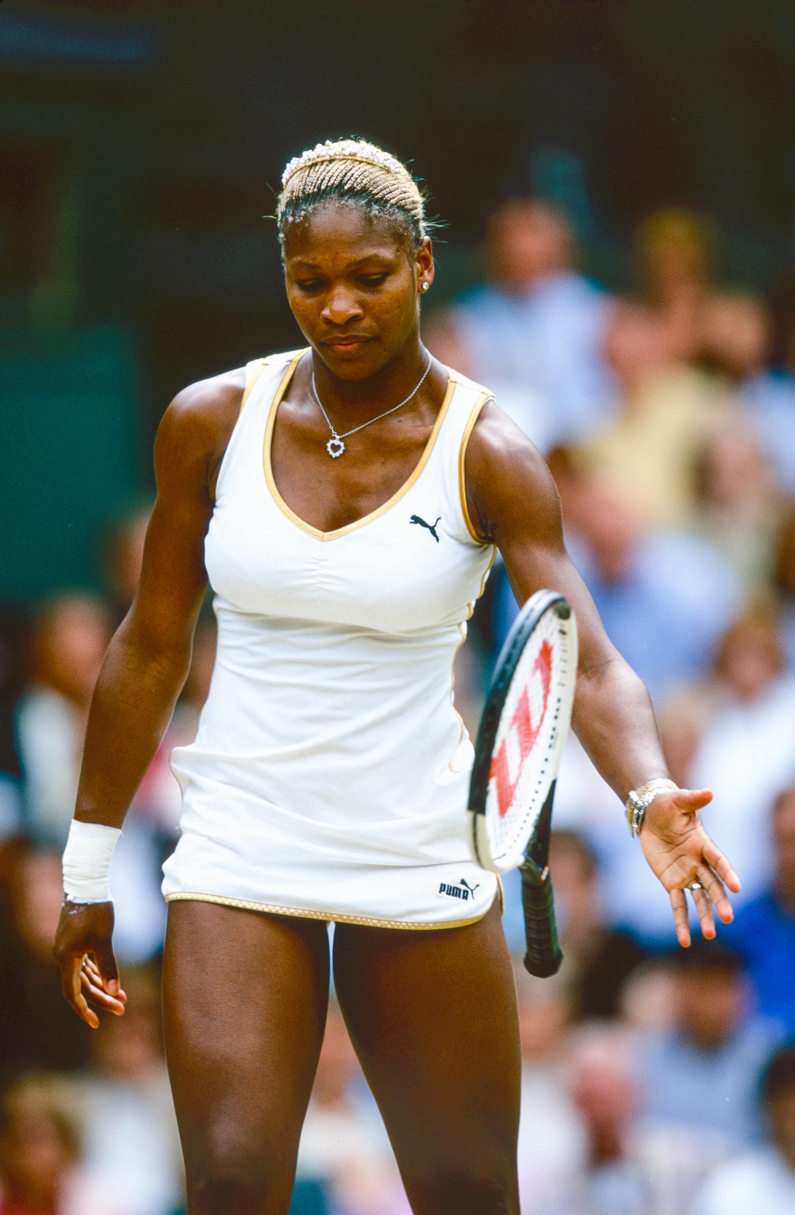 Serena Williams in action during the Women's Singles Final against her sister, Venus,  at Wimbledon on July 6, 2002 | Source: Getty Images