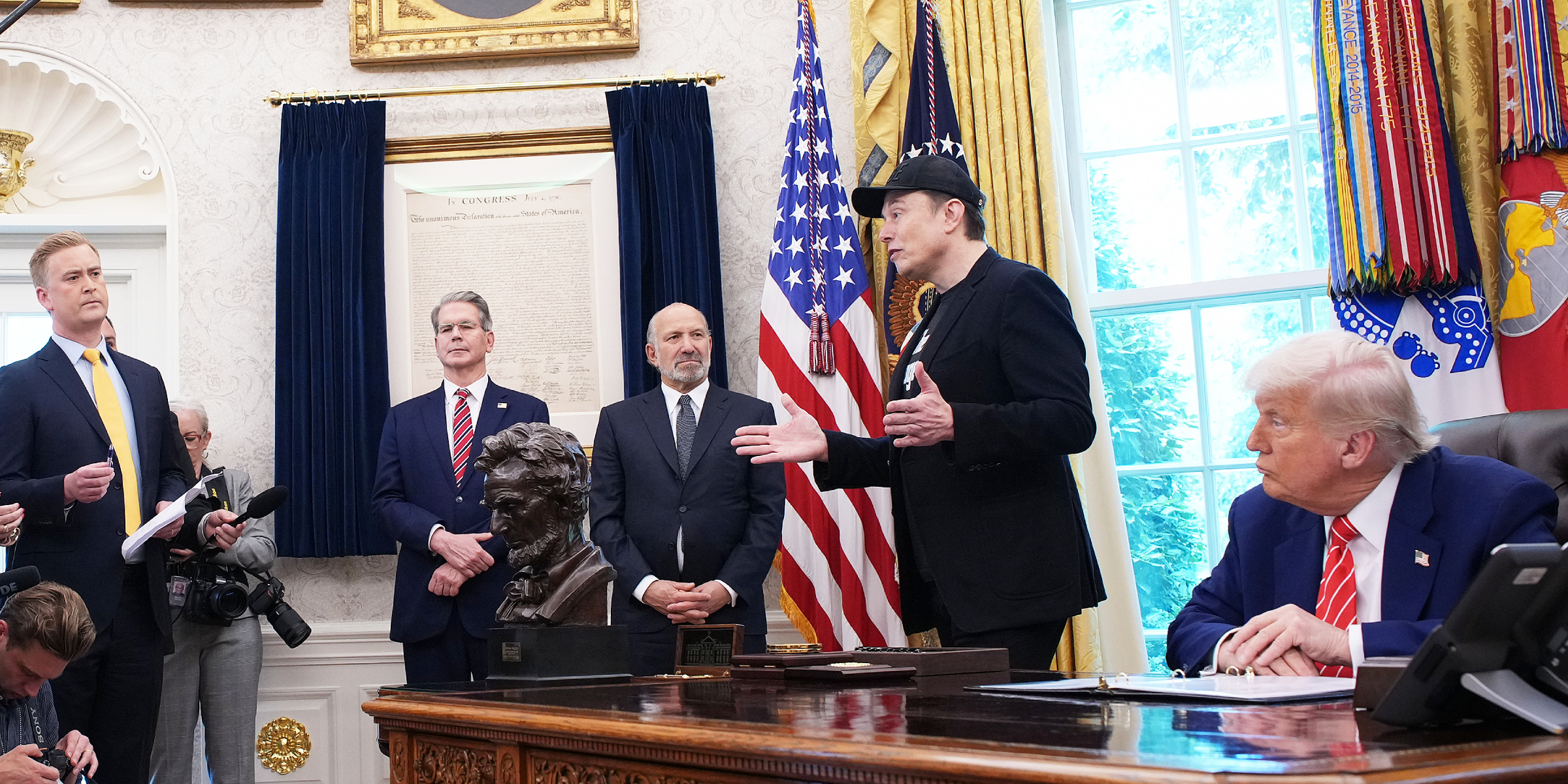 Elon Musk speaks alongside U.S. President Donald Trump to reporters in the Oval Office | Source: Getty Images