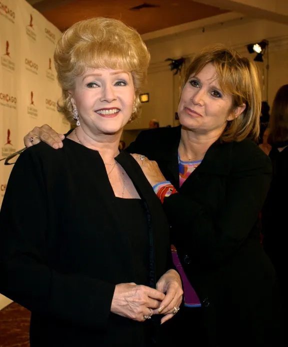 Debbie Reynolds and Carrie Fisher at the 2nd Annual "Runway for Life" celebrity fashion show at the Beverly Hilton August 19, 2003 | Photo: Getty Images