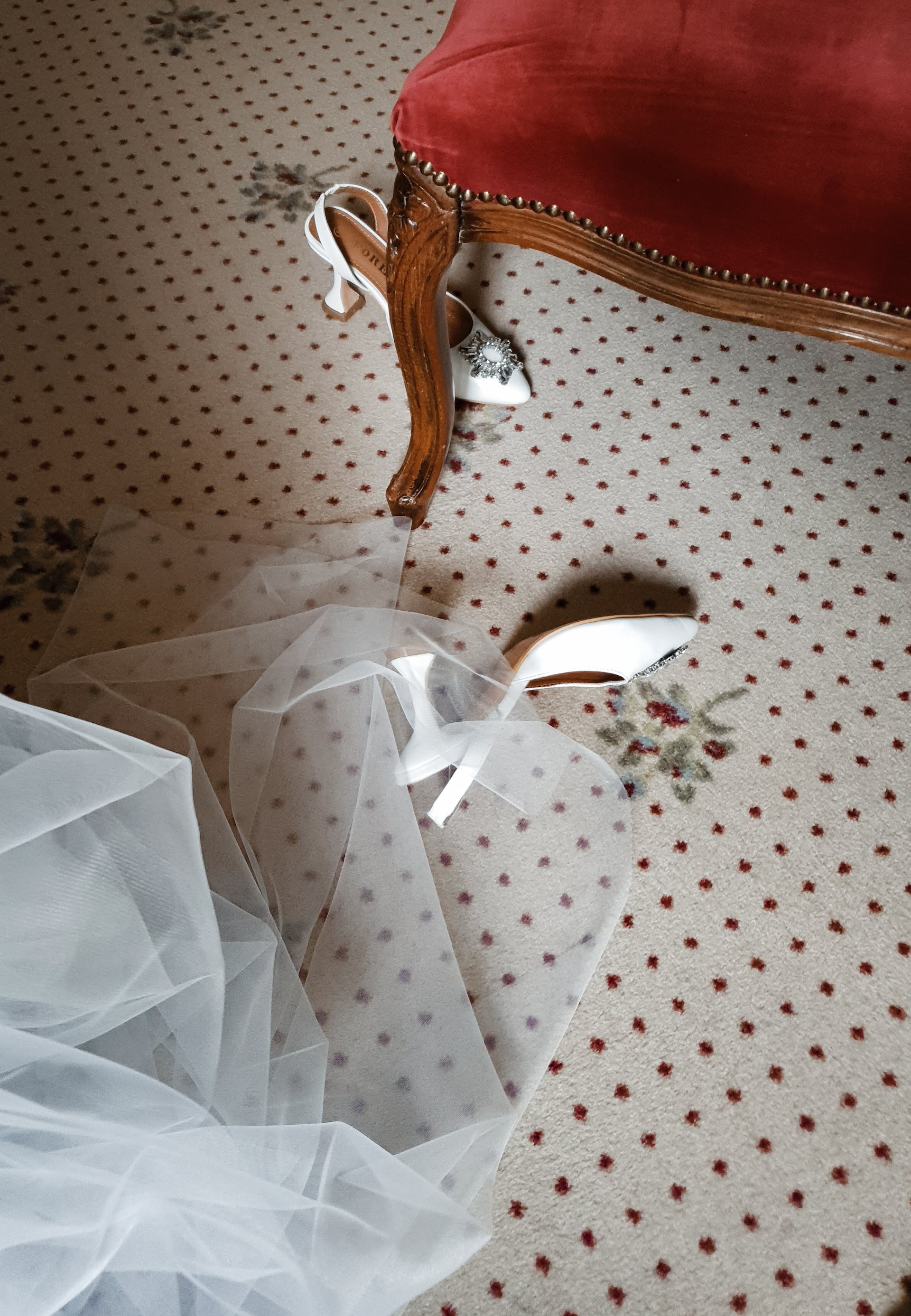 Wedding dress and shoes on floor | Source: Pexels