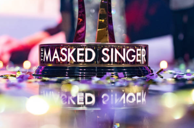 The trophy for the champion at the end of very season for the Fox network show "The Masked Singer" displayed on a stage | Photo: Getty Images