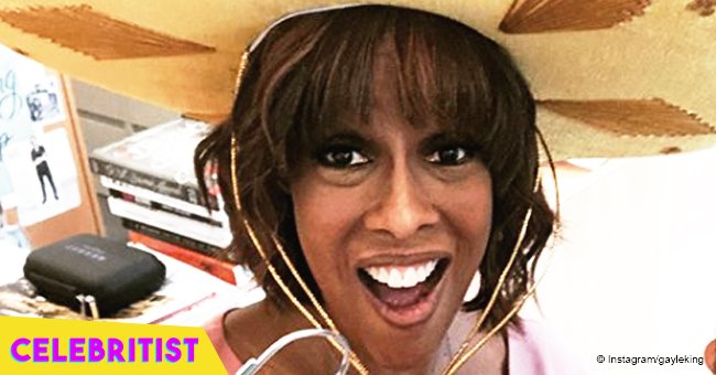 Gayle King stuns in floral, white dress in recent picture with adult daughter and son