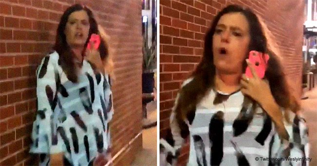 Drunken white woman goes on racist rant at black men outside a bar in viral video