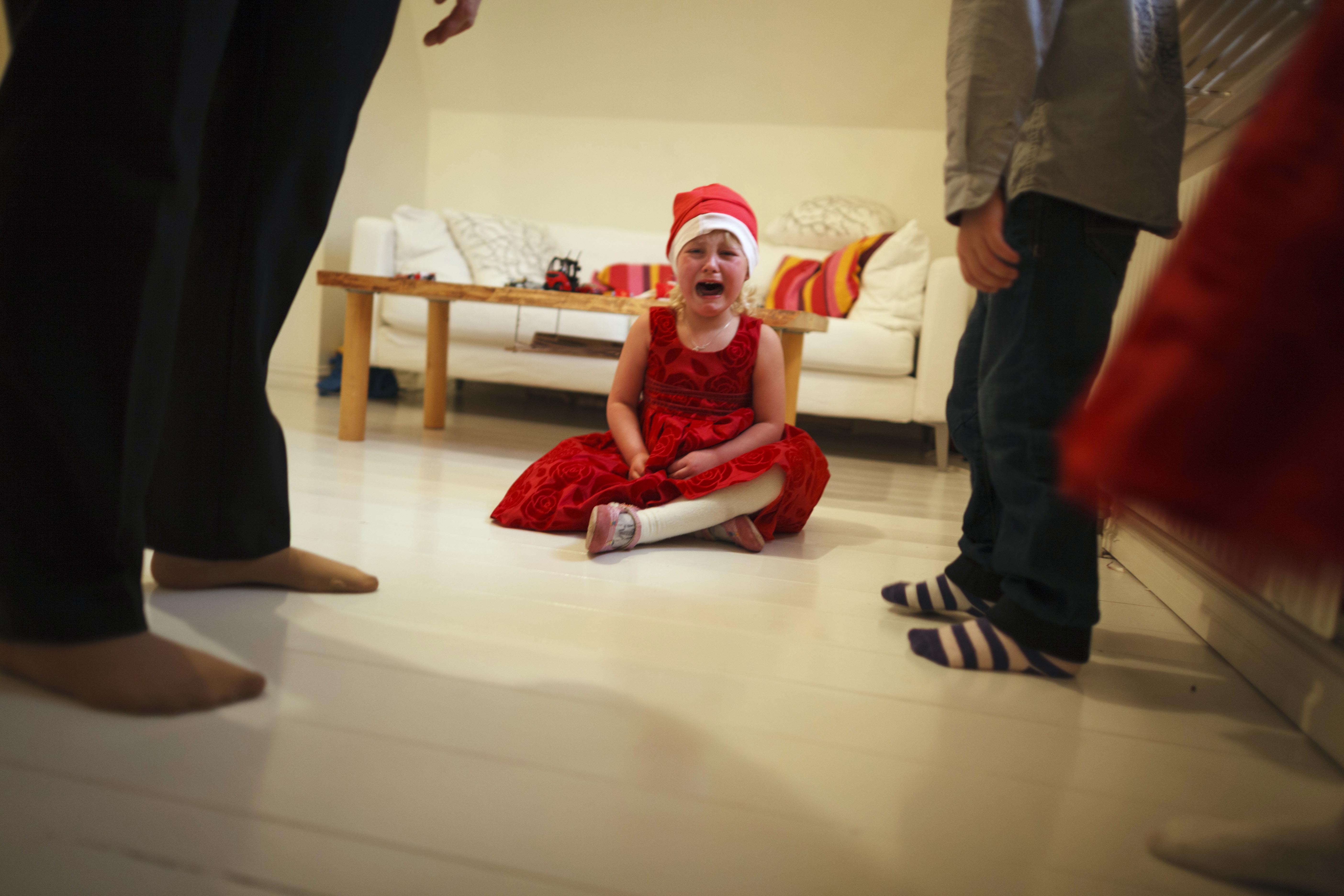 Young girl crying at Christmas | Source: Getty Images