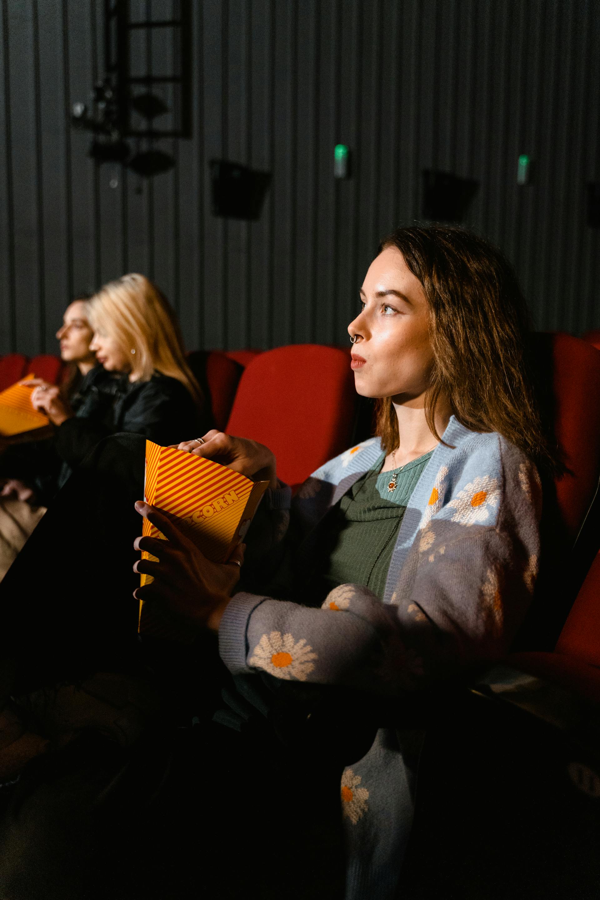 Women at a movie theatre | Source: Pexels