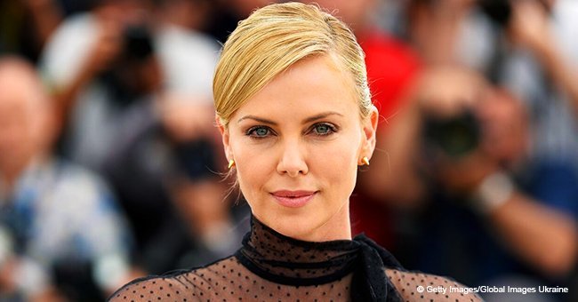 Actress Charlize Theron slammed for dressing adopted black son like a schoolgirl