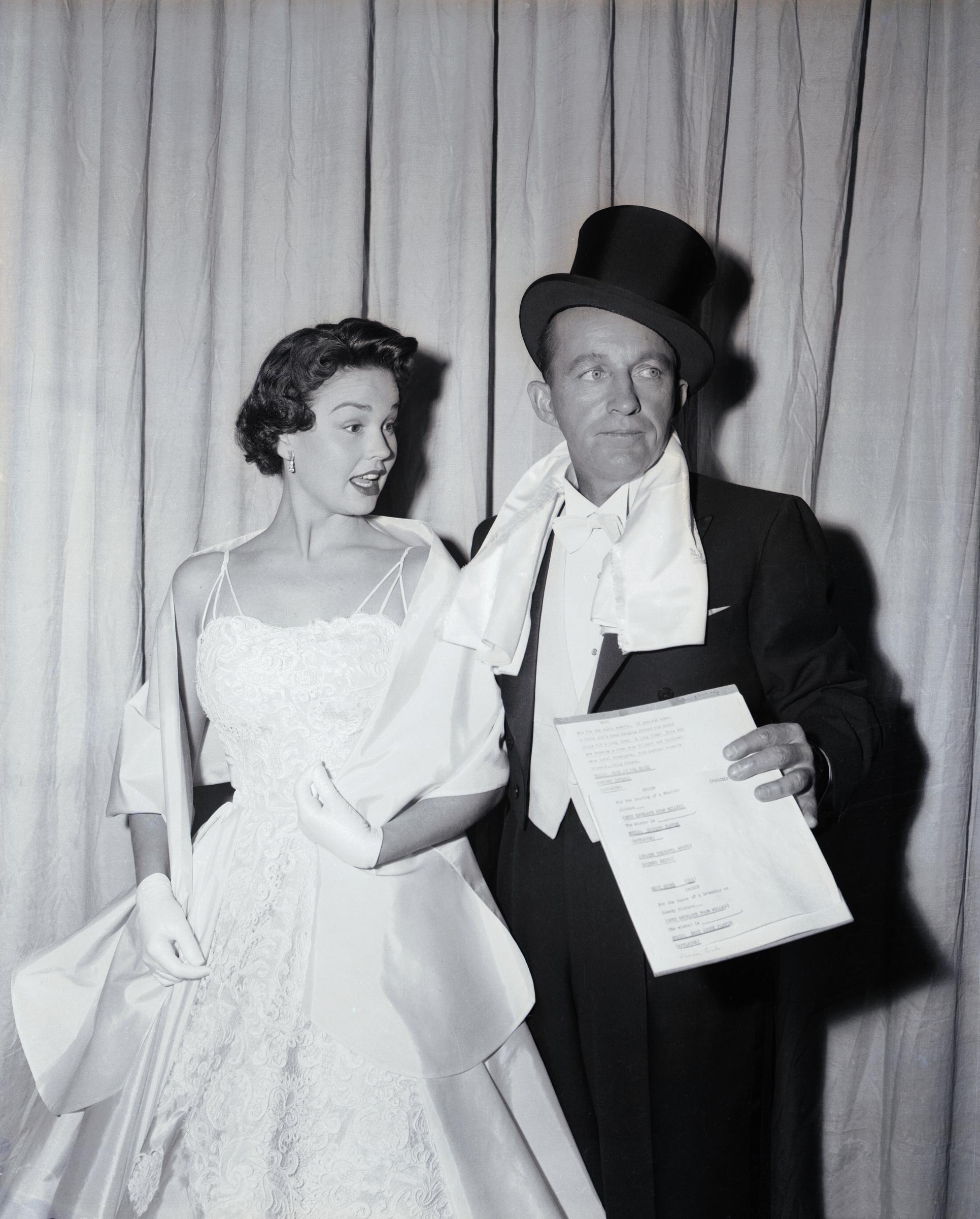 Bing Crosby and Kathryn Crosby at the 27th Annual Academy Awards on March 30, 1955 | Source: Getty Images