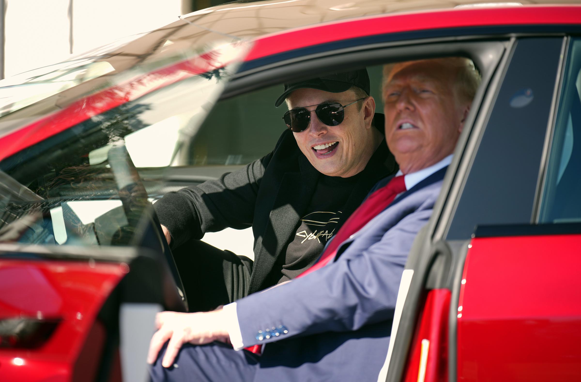 U.S. President Donald Trump and White House Senior Advisor, Tesla and SpaceX CEO Elon Musk sit in a Model S on the South Lawn of the White House on March 11, 2025, in Washington, D.C. | Source: Getty Images