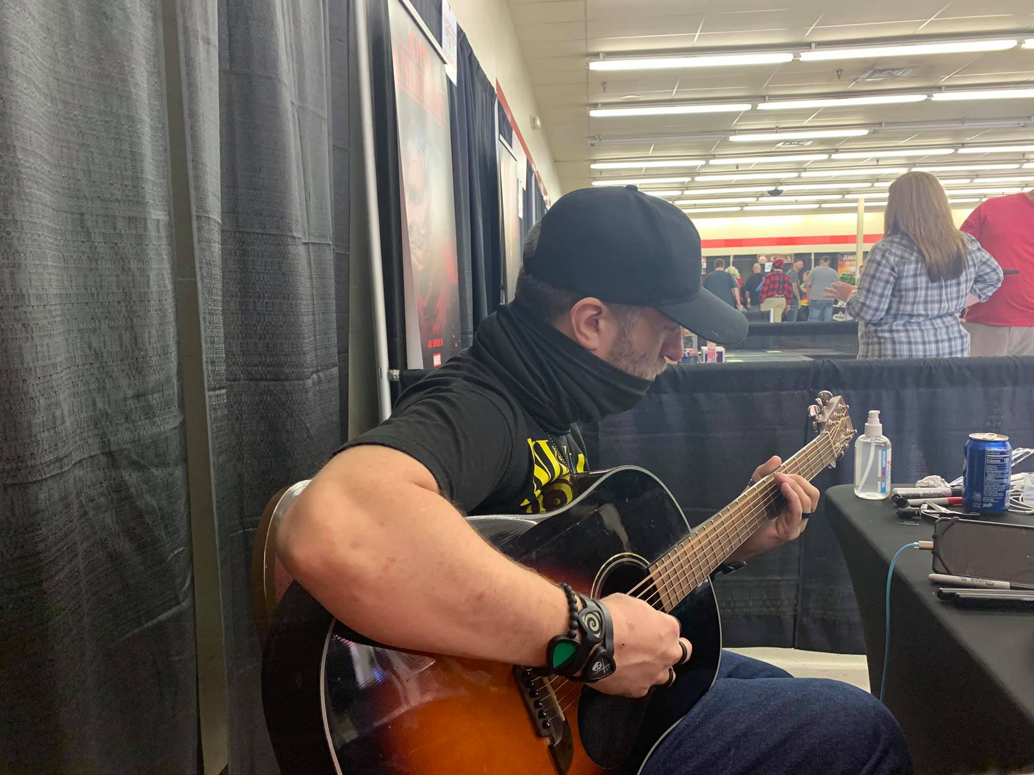Dustin Diamond having a quiet moment to himself, playing his guitar. October, 2020. | Photo: Facebook/dustindiamond.