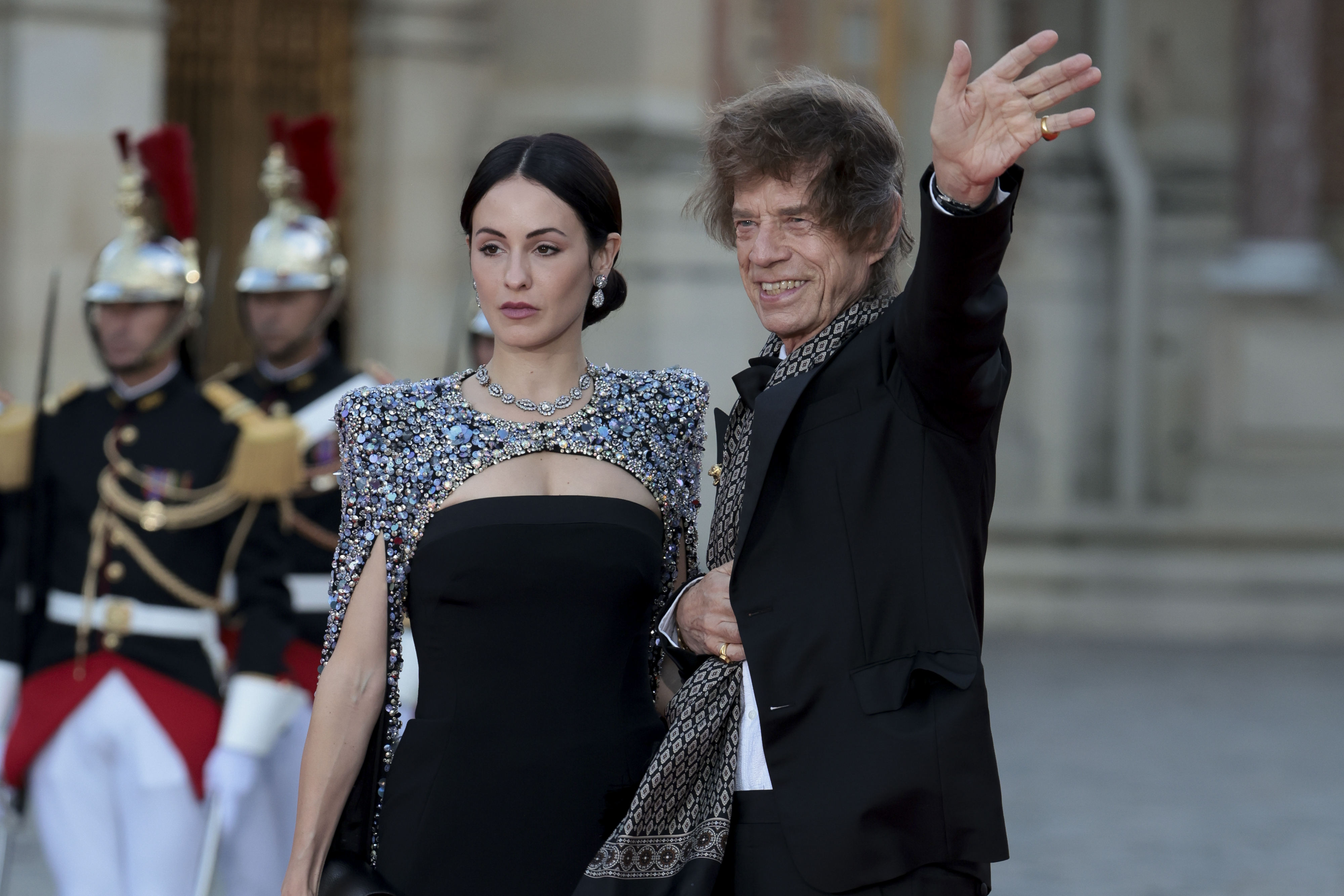 Melanie Hamrick and Mick Jagger arrive ahead of the state dinner at the Palace of Versailles on 20 September 2023 in Versailles, France. | Source: Getty Images
