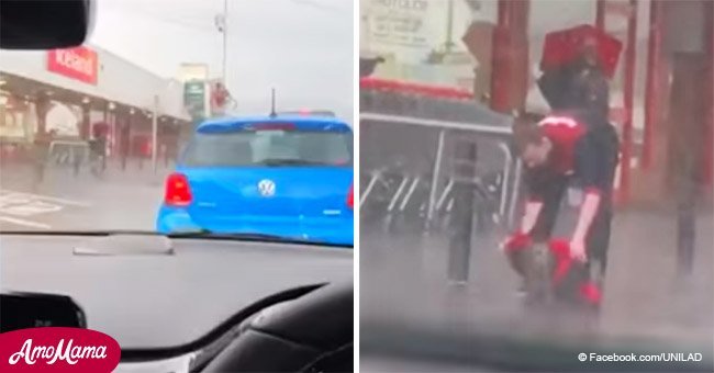 A store worker gave his jacket to a dog left outside to wait in the pouring rain