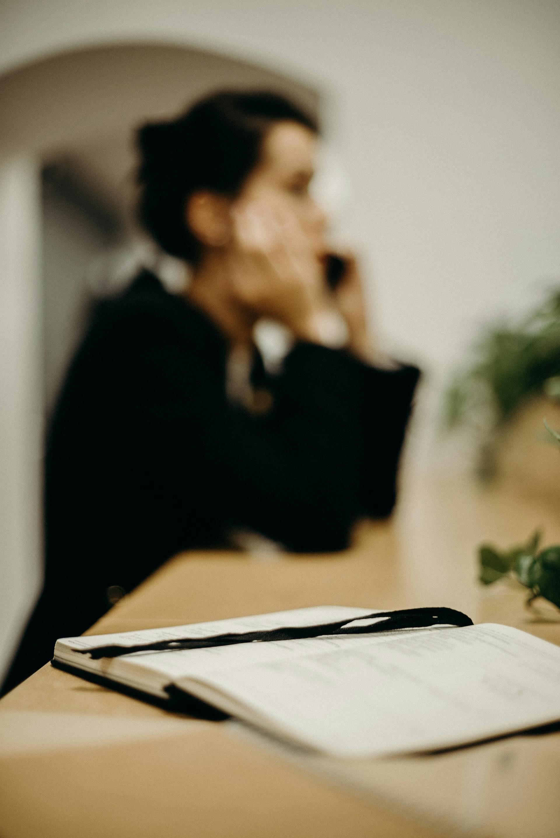 A woman talking on the phone | Source: Pexels