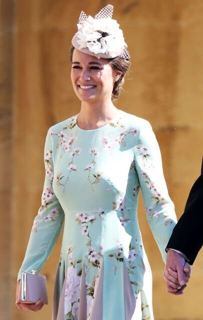Pippa Middleton reveals a glimpse of her baby bump in a white dress at ...