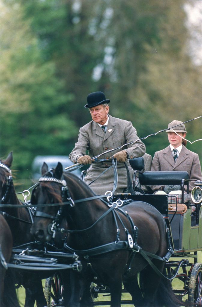 Prince Philip in a horse-drawn carriage at an equestrian event in Windsor in 1996 | Source: Getty Images