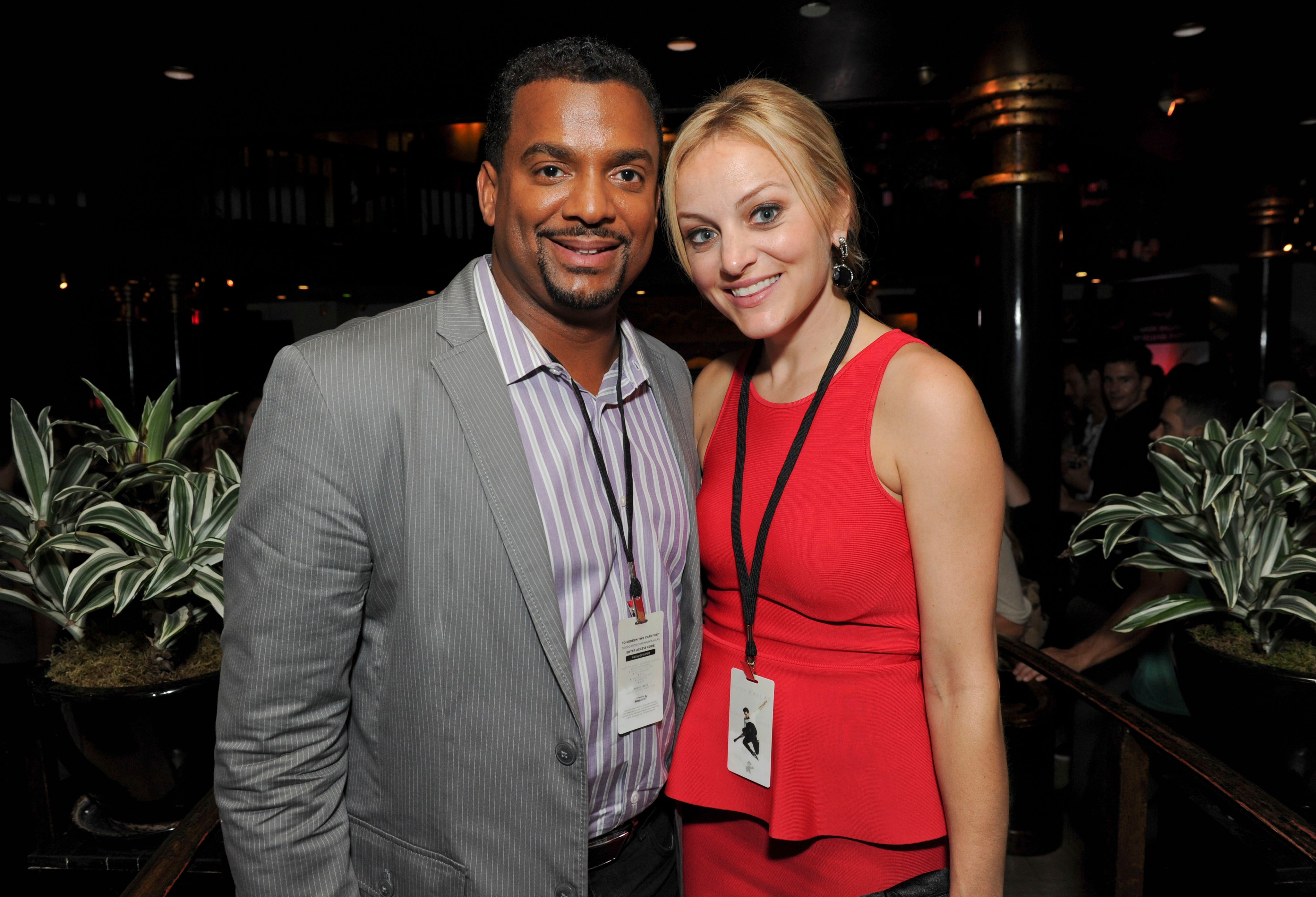 Alfonso Ribeiro and his wife attending Mark Ballas Debuts EP "Kicking Clouds" on September 16, 2014 in California. Photo by Allen Berezovsky | Source: Getty Images