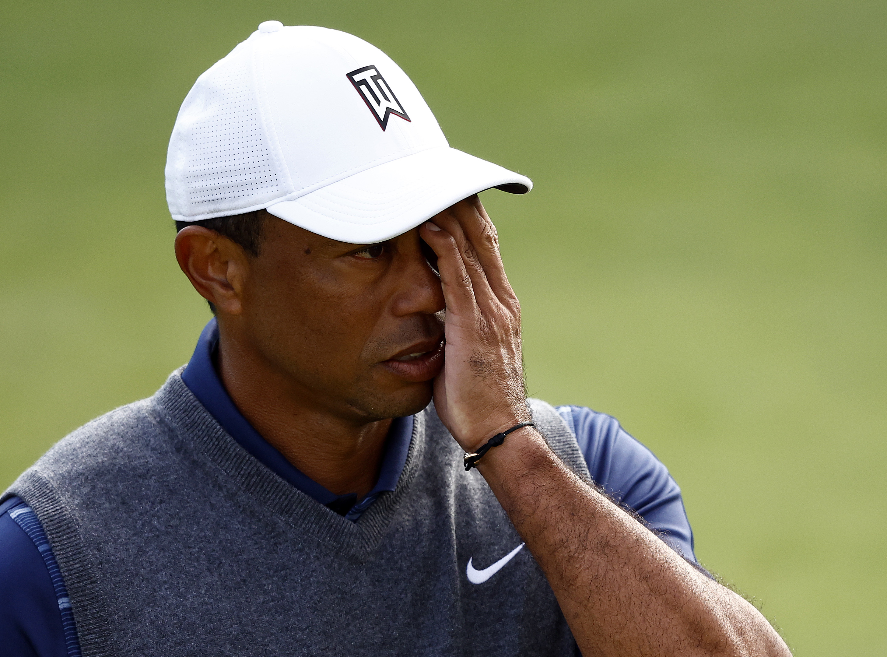 Tiger Woods covers his eye during a practice round at The Genesis Invitational in Pacific Palisades, California, on February 14, 2023 | Source: Getty Images