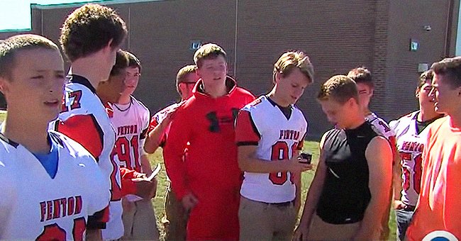 The team of football players who rescued a boy from a creepy stranger | Photo: Youtube/WXYZ-TV Detroit | Channel 7 
