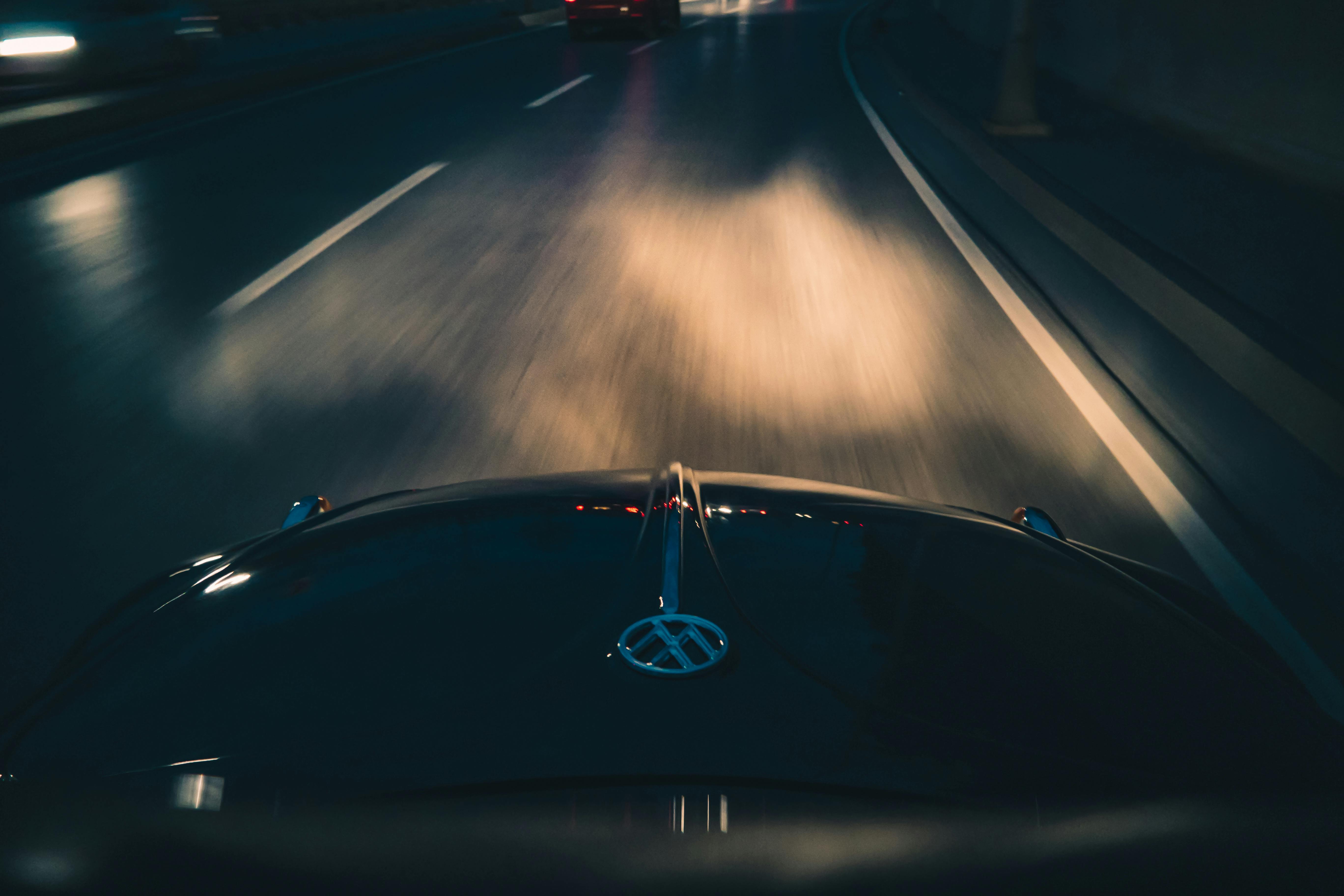 A car being driven at night | Source: Pexels