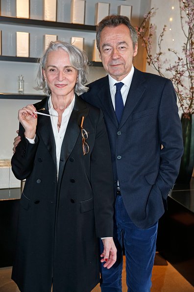 Martine Denisot et son mari Michel Denisot à Paris dans la boutique Liquide le 17 mars 2016. | Photo : Getty Images