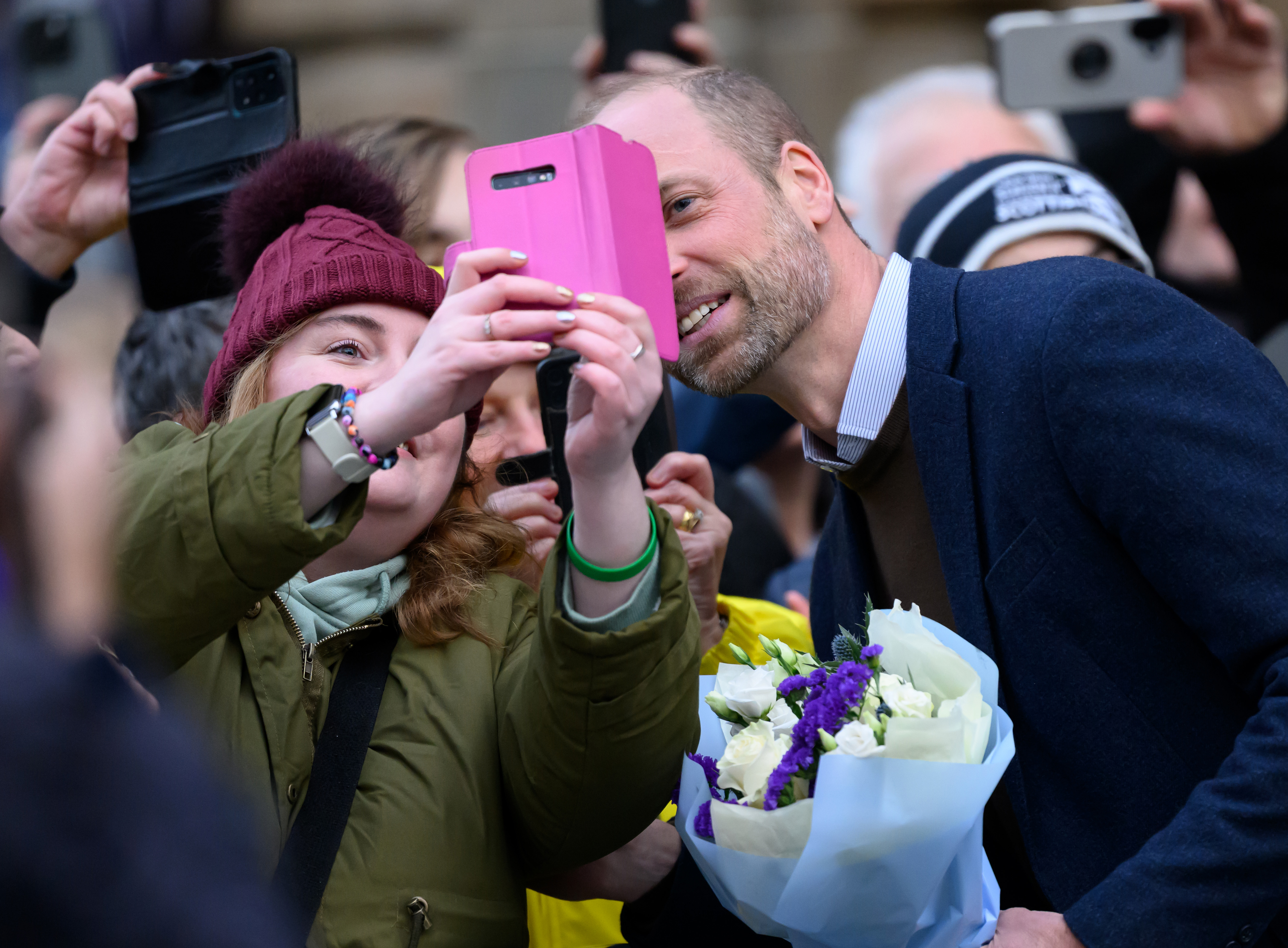 Prince William, Prince of Wales poses for a selfie after visiting Radical Weavers, a working hand-weaving studio and independent charity on 20 January 2026 in Stirling, Scotland. | Source: Getty Images