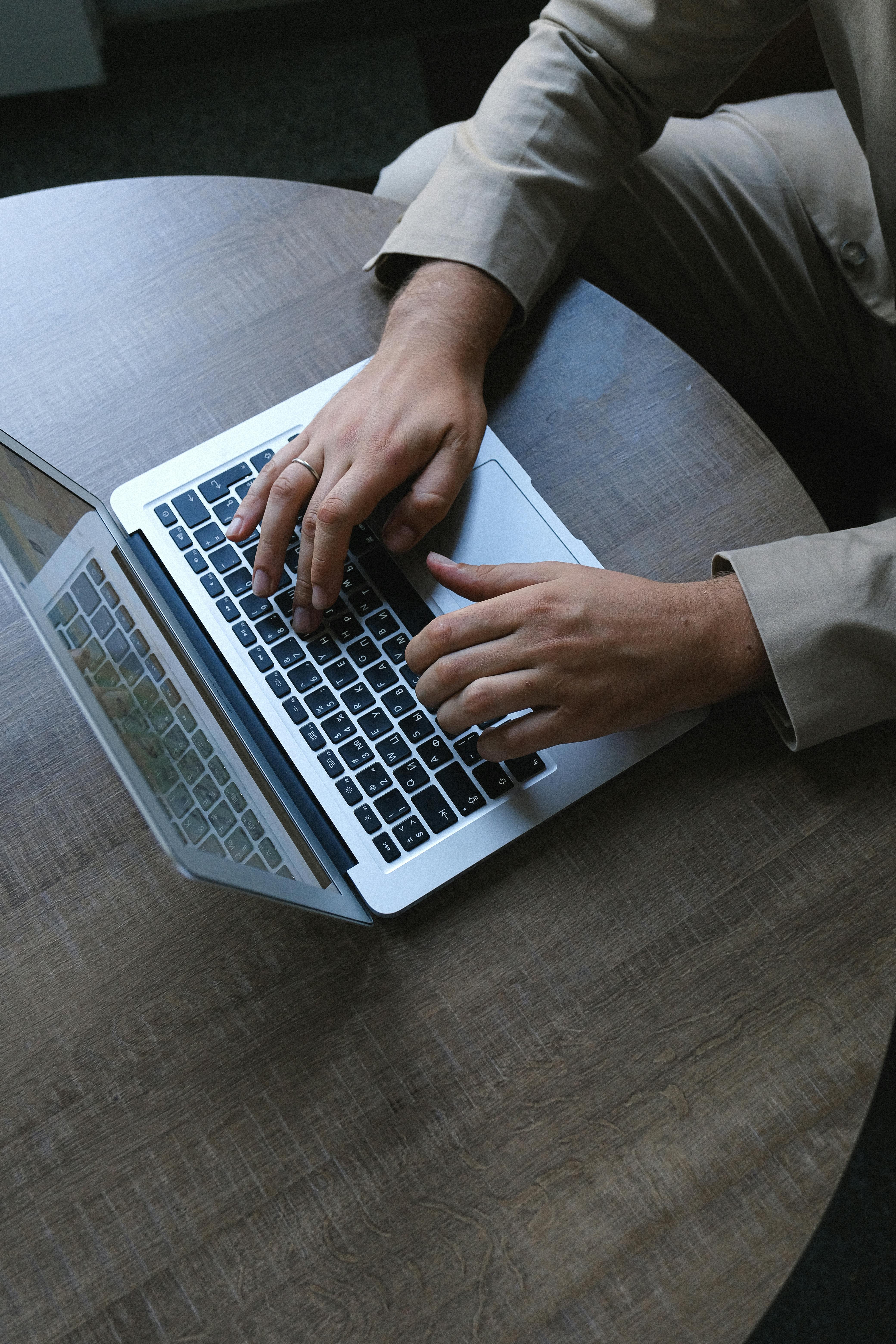 A man working on a laptop in his office | Source: Pexels