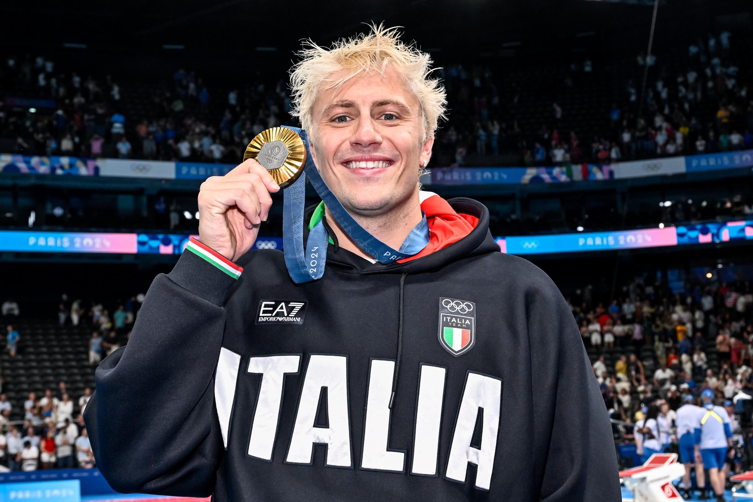 Nicolo Martinenghi of Italy holds his gold medal after the Mens 100m Breaststroke Final at the Paris 2024 Olympic Games on July 28, 2024 | Source: Getty Images