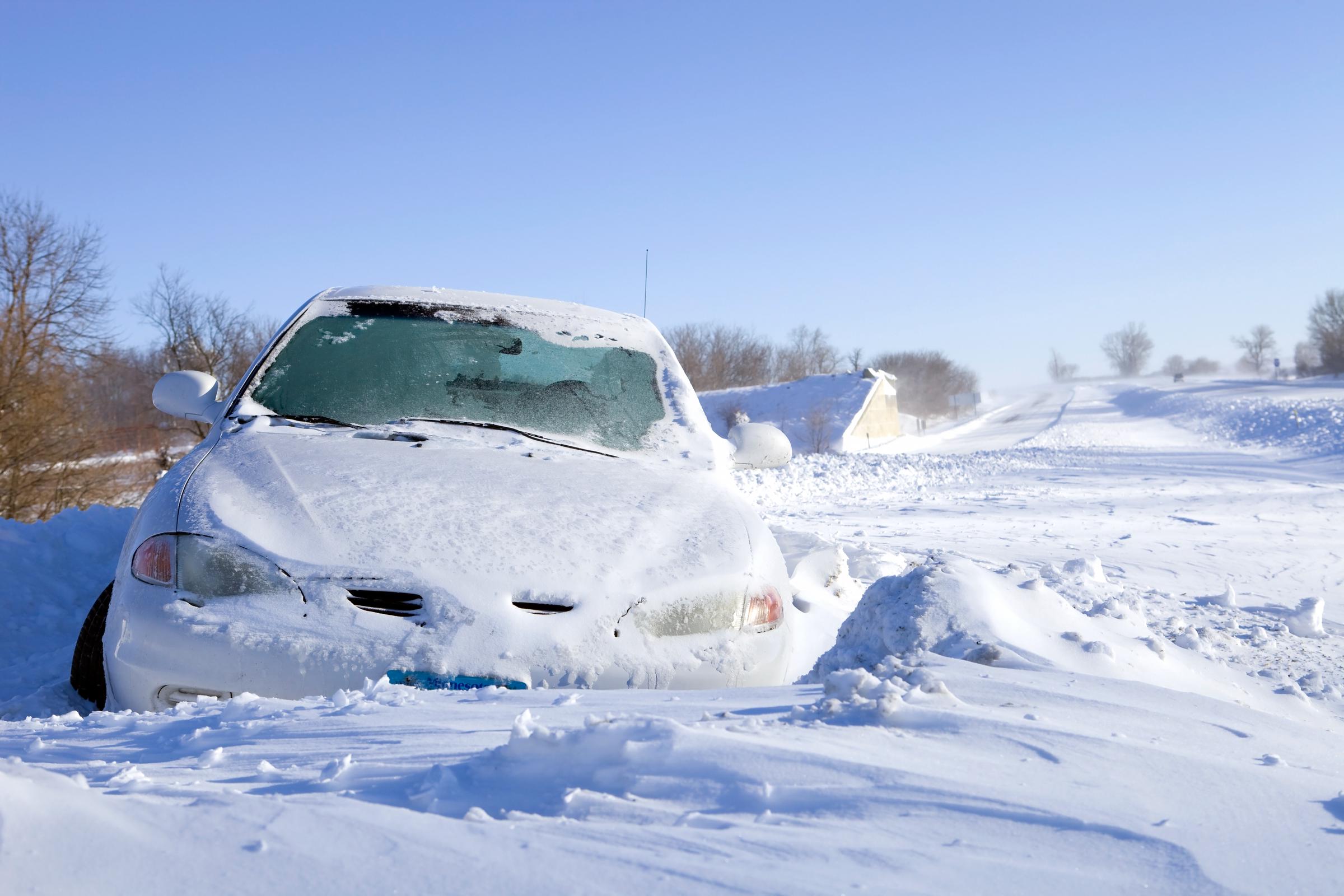 A car stuck in the snow off an Interstate Highway, dated December 13, 2010 | Source: Getty Images