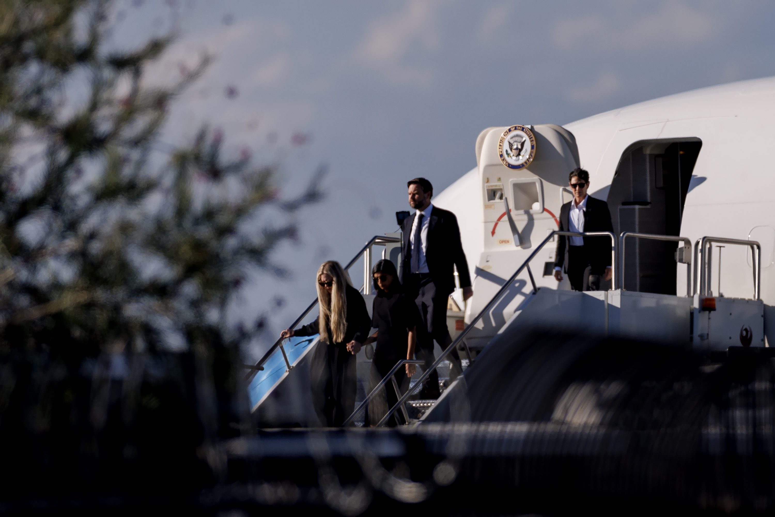 JD Vance (R), Usha Vance (C), and Erika Kirk deplane Air Force Two while escorting the body of Charlie Kirk on September 11, 2025, in Phoenix, Arizona | Source: Getty Images