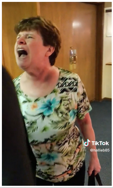 The woman shouting at the TikToker's father | Source: TikTok.com/hallieb85