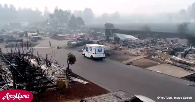 Haunting footage shows postal worker delivering mail to scorched homes