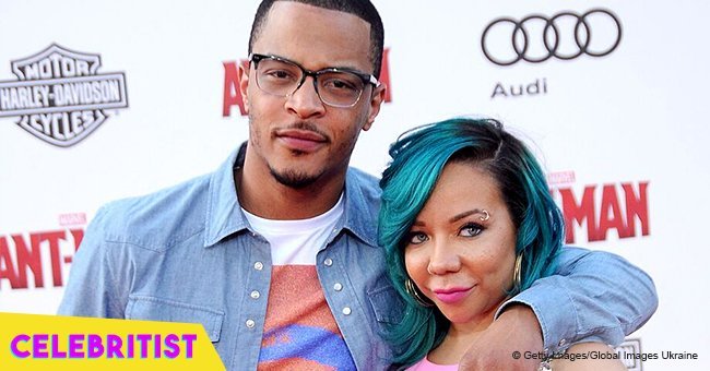 T.I. showers Tiny with kisses as they dance at her birthday party in new video