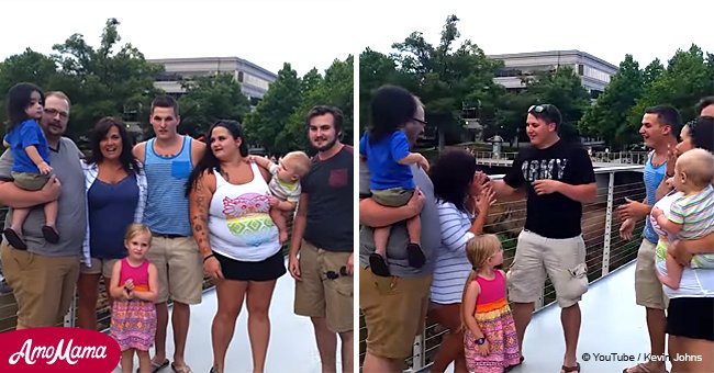 Family poses for group photo, but suddenly soldier son surprises mom with adorable photobomb