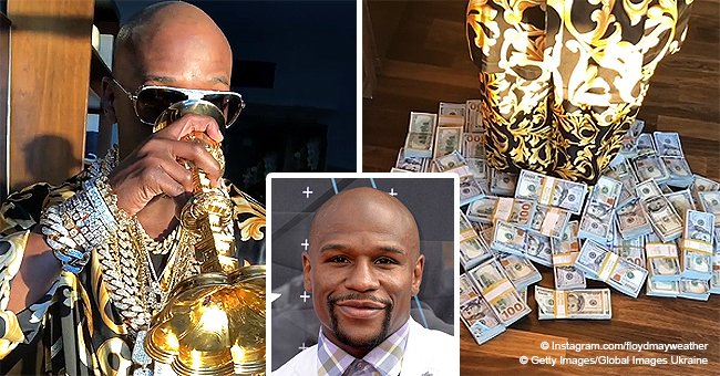 Floyd Mayweather flaunts his wealth by sipping from a gold cup while ...