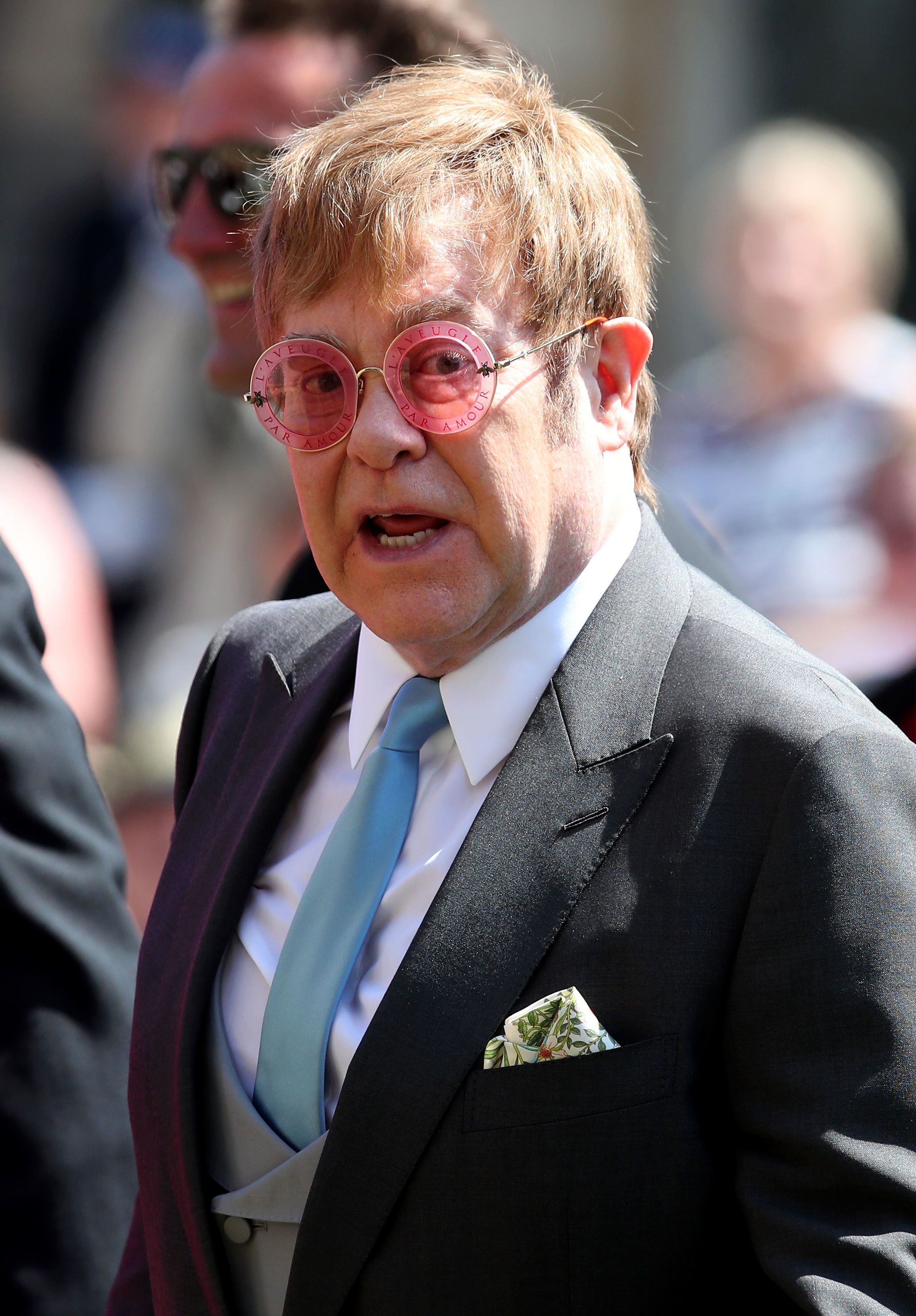 Elton John leaves St George's Chapel at Windsor Castle after the wedding of Prince Harry to Meghan Markle. | Source: Getty Images