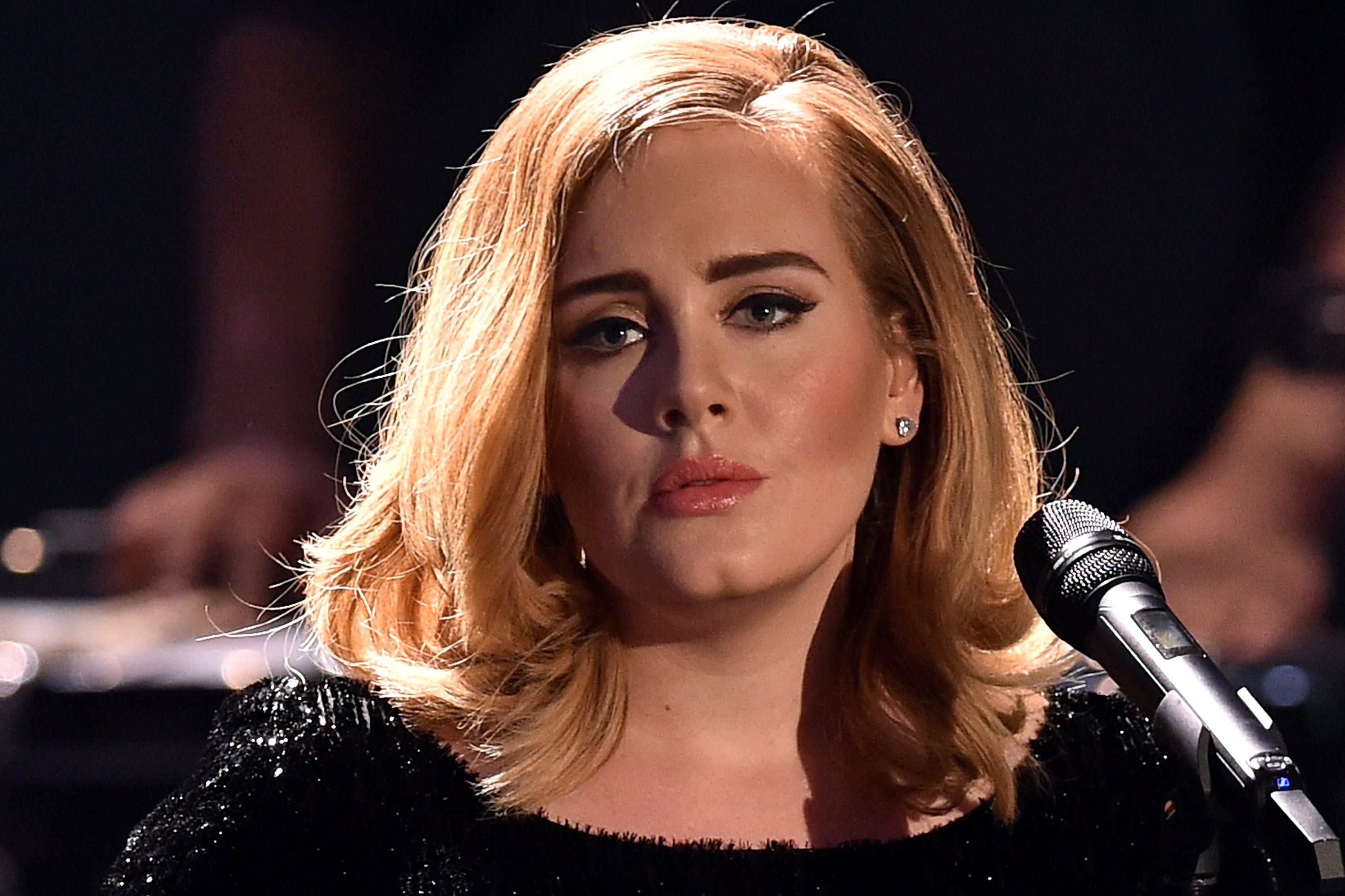 Adele performs live on stage during a television show on December 6, 2015 in Cologne, Germany. | Source: Getty Images