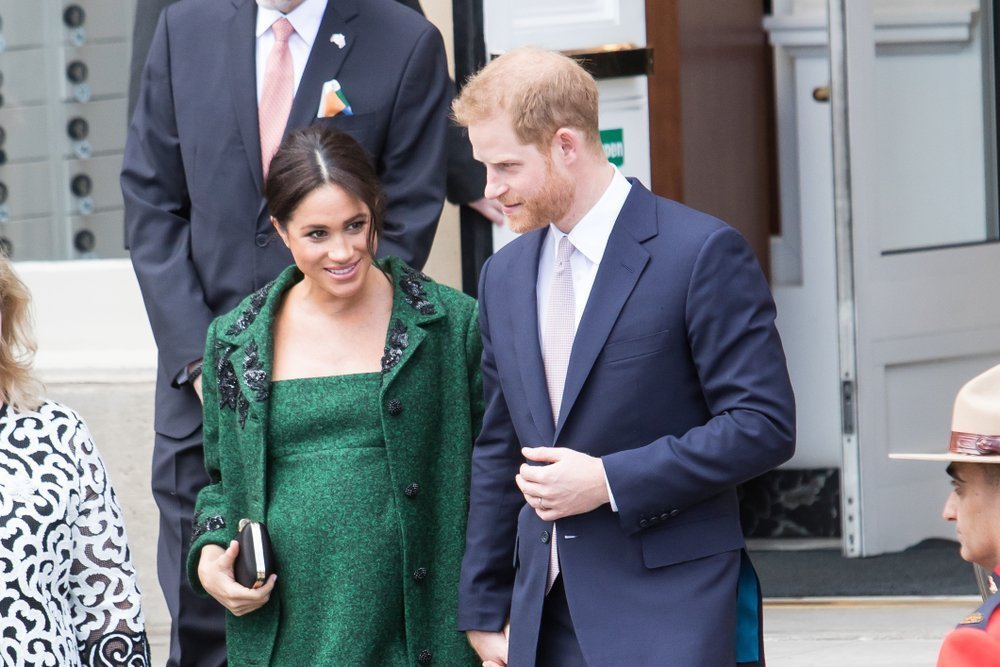 Meghan Markle and Prince Harry receive flowers after leaving Canada House on the March 11, 2019 in London, UK | Source: Shutterstock