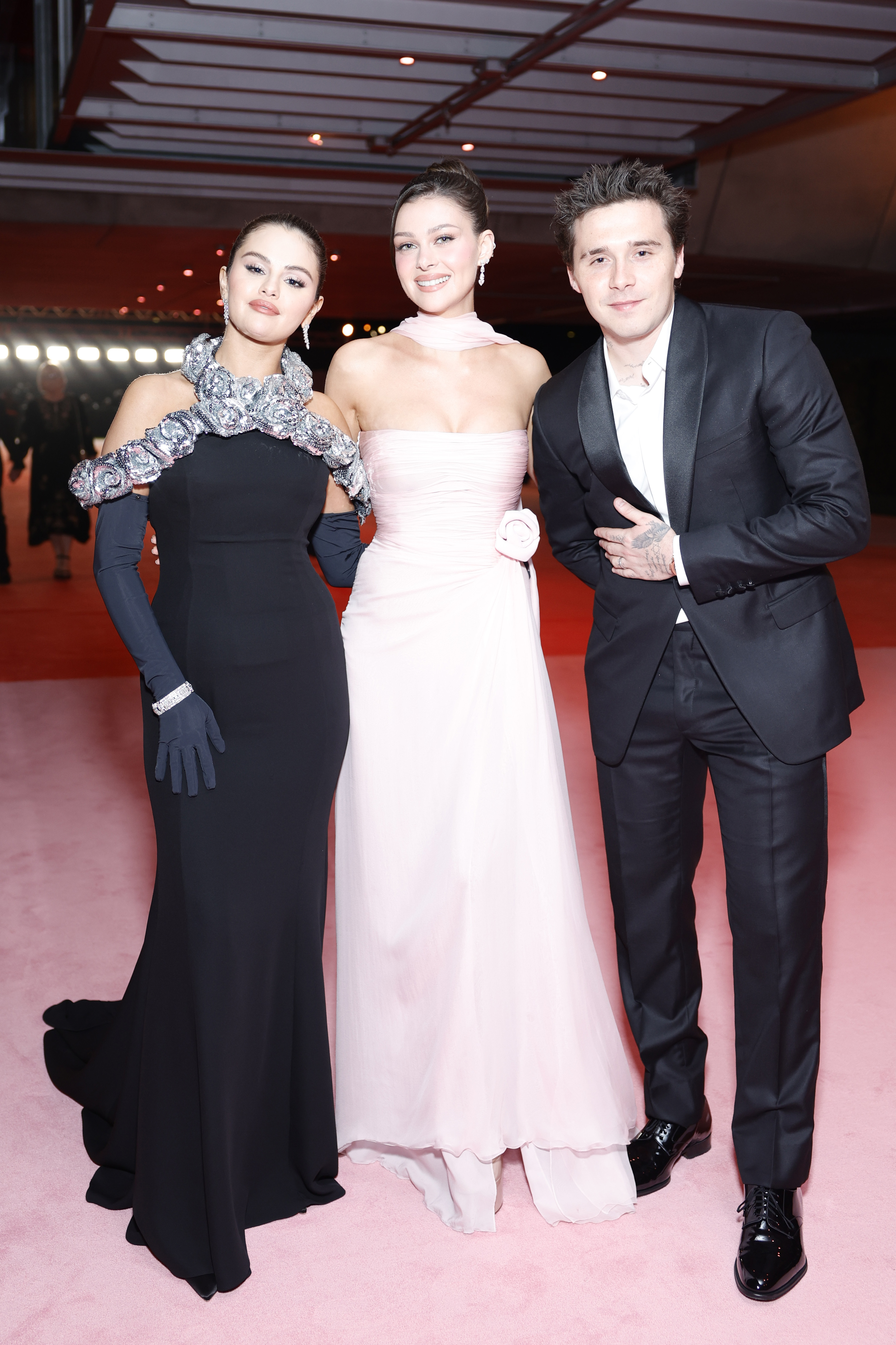 Selena Gomez with Nicola and Brooklyn Peltz Beckham at the Academy Museum of Motion Pictures 3rd Annual Gala on December 3, 2023, in Los Angeles, California. | Source: Getty Images