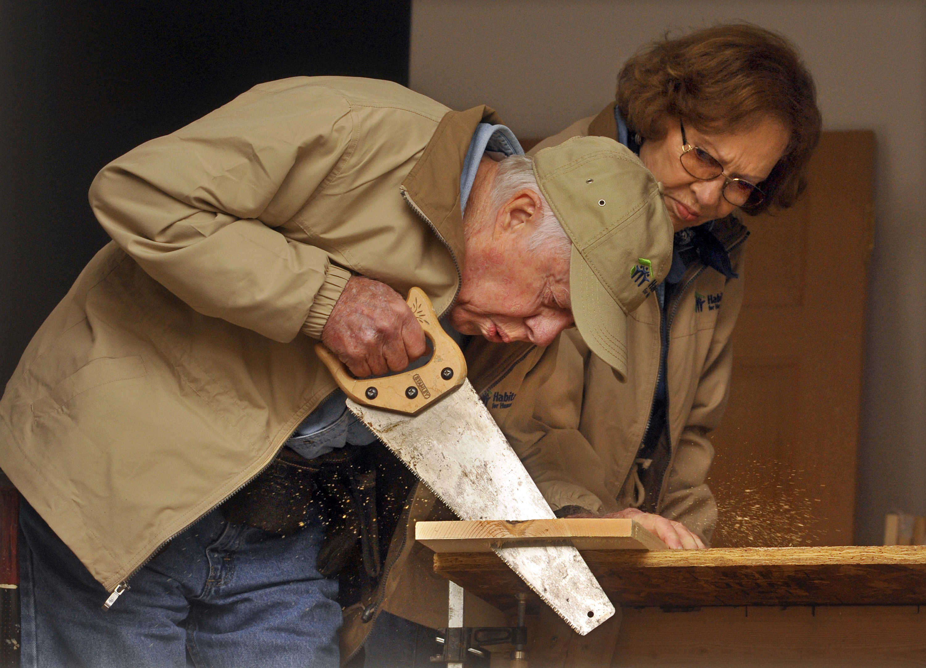 Jimmy and Rosalynn Carter working on houses in Baltimore, Maryland, and Annapolis as part of a weeklong nationwide project with Habitat for Humanity, on October 5, 2010. | Source: Getty Images