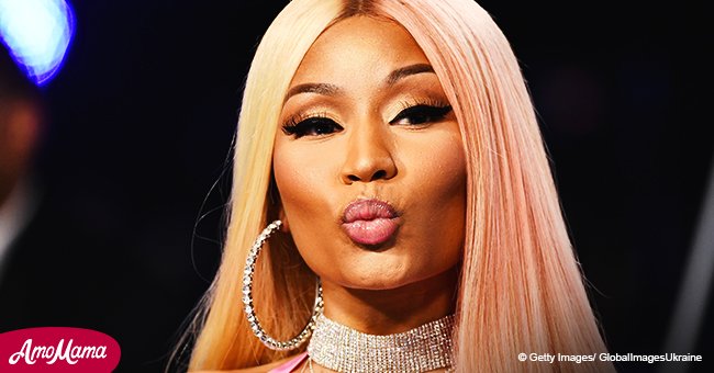 Nicki Minaj, 35, makes a daring choice as she nearly bares all in a low-cut leather outfit